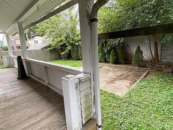 The shared backyard and patio scream for you to set out your outdoor table or start your grill.