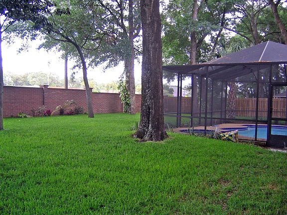 Home also features a large fenced backyard.