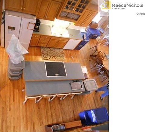 Large country kitchen with attached dining area
