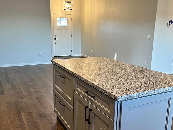 kitchen island, all counters are granite