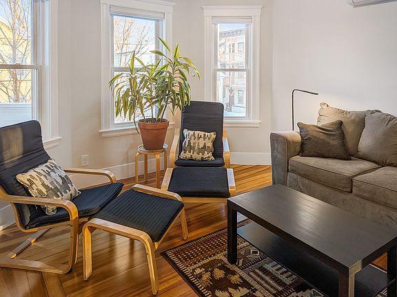Living room with bay windows