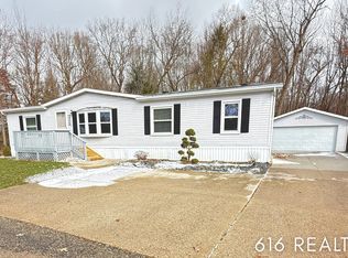 7358 Willow Wood Dr NE, Belmont, MI 49306