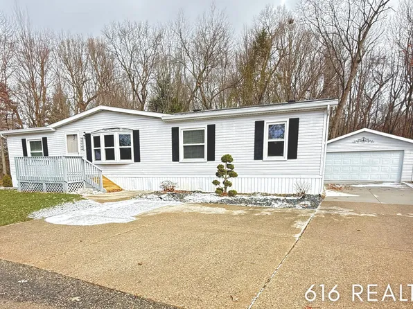 7358 Willow Wood Dr NE, Belmont, MI 49306