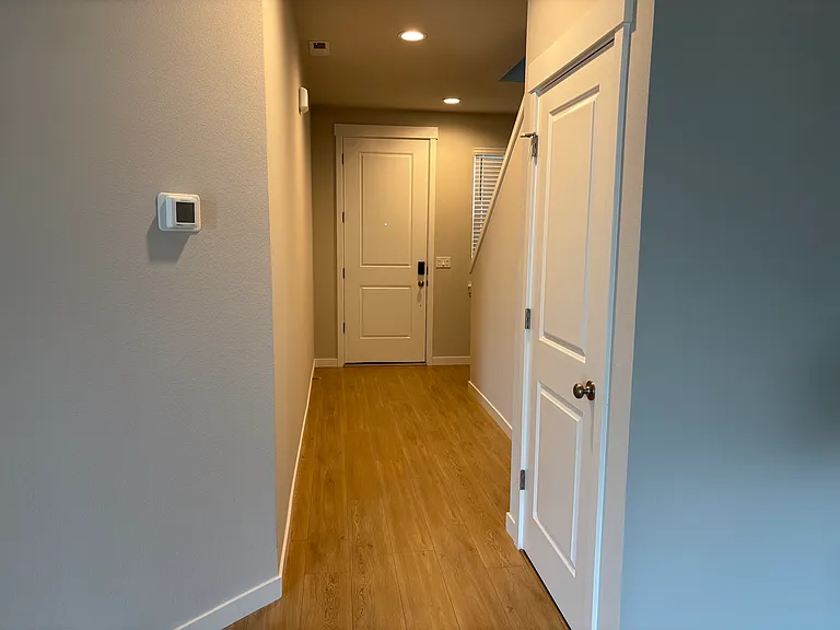 FRONT ENTRY VIEW FROM INSIDE LIVING ROOM