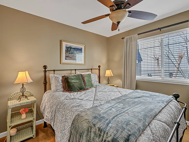 Old photo of bedroom with furniture.