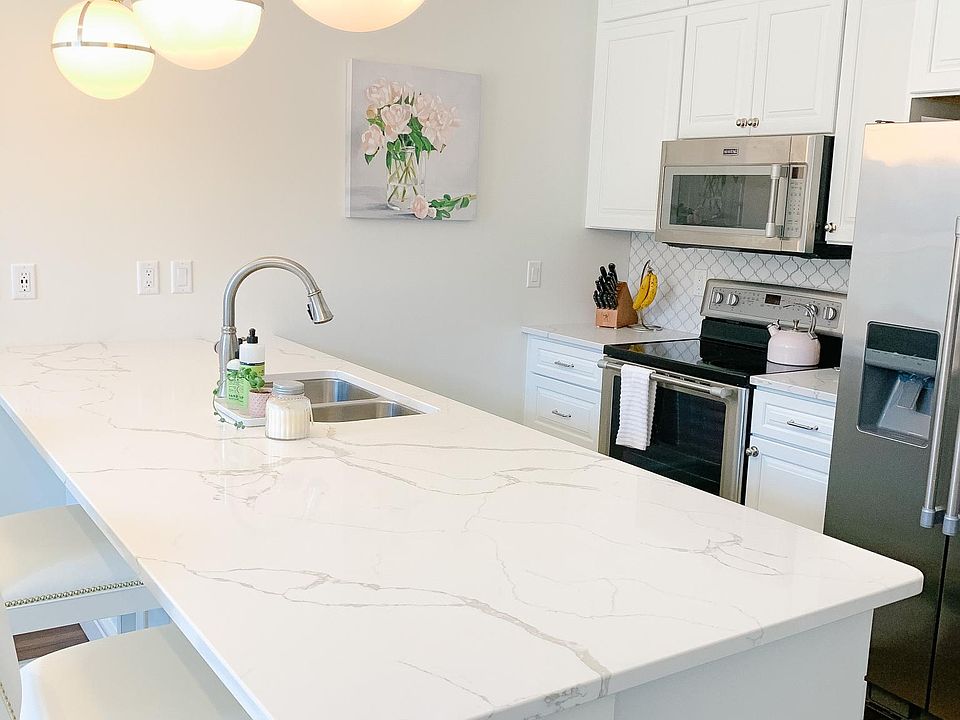 Beautiful white quartz countertops in fabulous kitchen