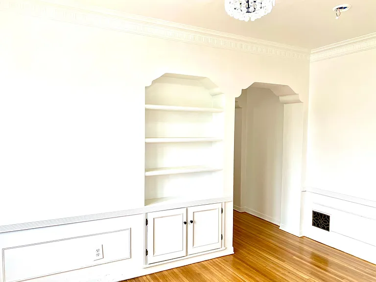 dining room with built-in shelving