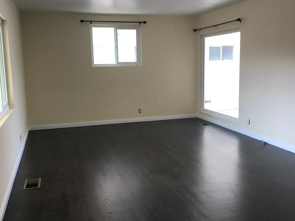 Living room with picture window...plenty of sunlight