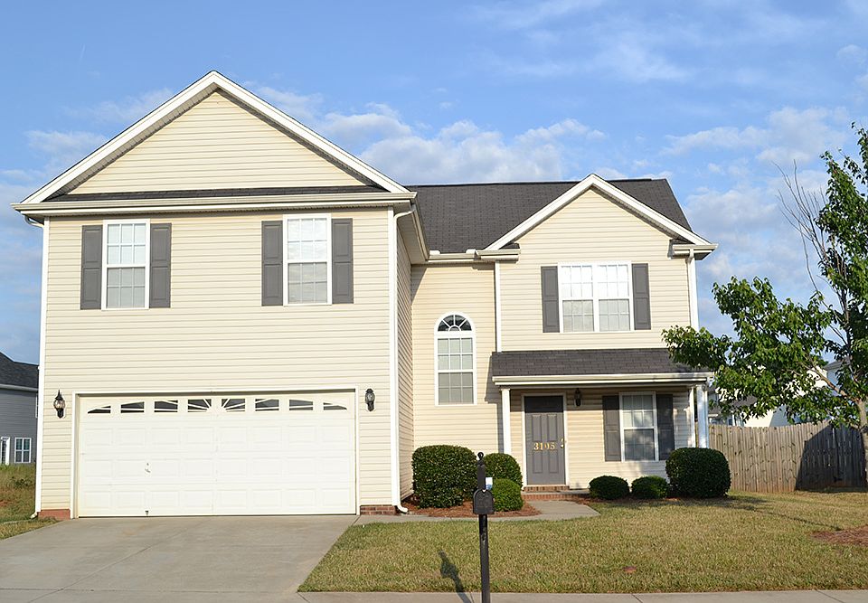 This home features a grand master suite with a spa