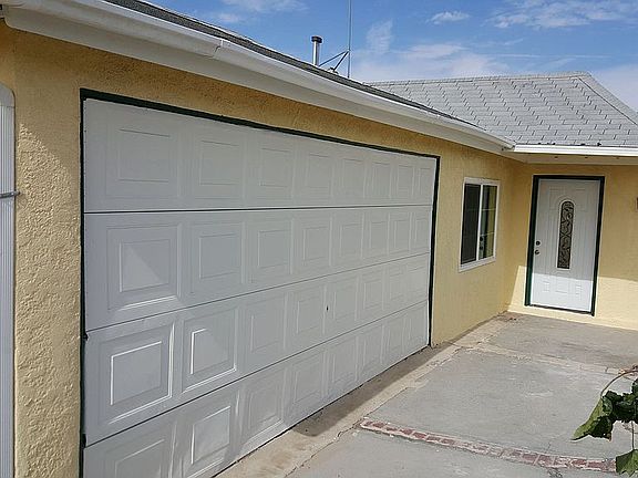 Front yard and Garage Door