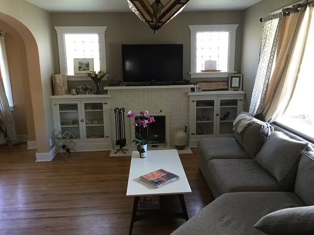 Living room, fireplace and build in shelves.