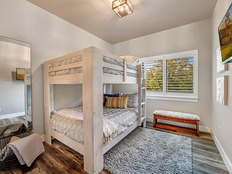 Bedroom $3 With 2 Queen Size Plush Bunk Beds. Mounted TV & Closet Full Of Toys.