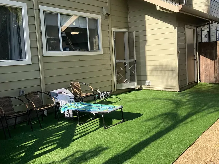 Backyard with exterior storage closet