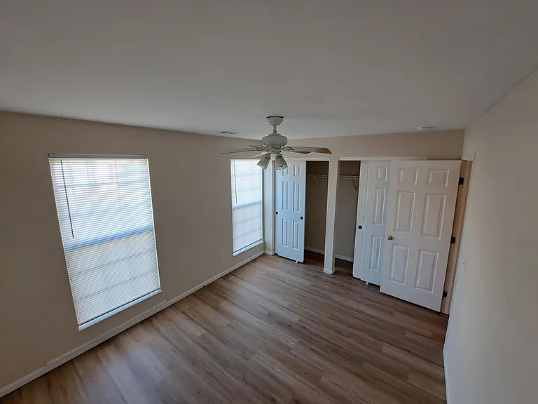 2nd bedroom, double closet, front of home.