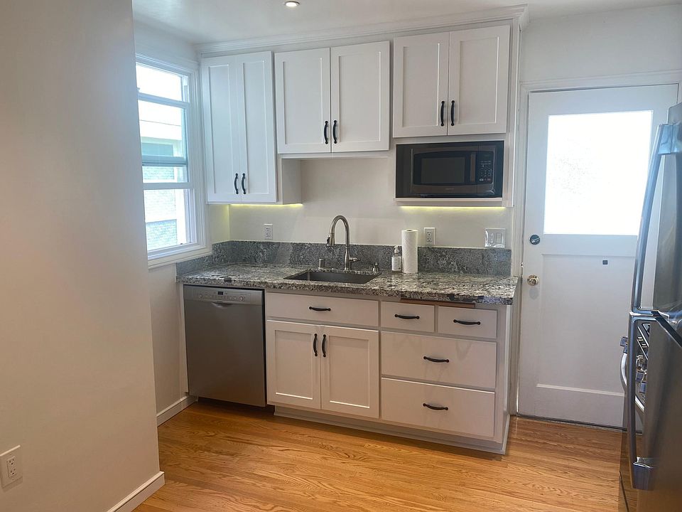 Stainless steel sink with garbage disposal, and under cabinet lighting