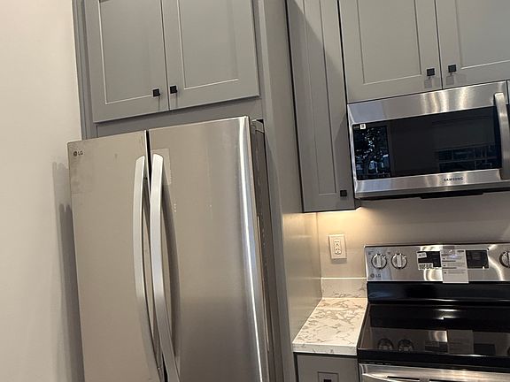 Brand new construction. Full stainless steel appliances, gray cabinets, and quartz countertops. Move-in ready!