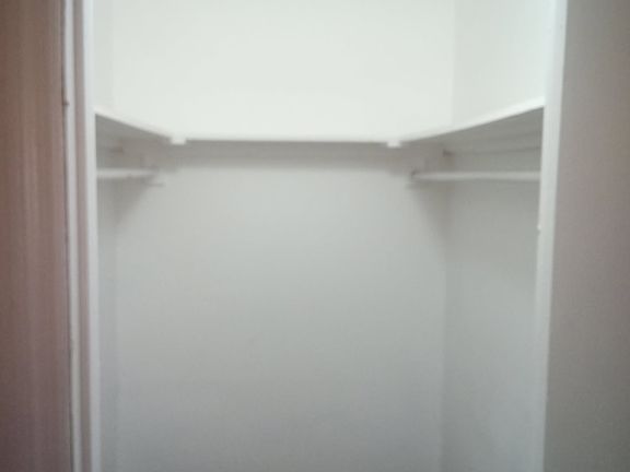 walk in closet in the bedroom