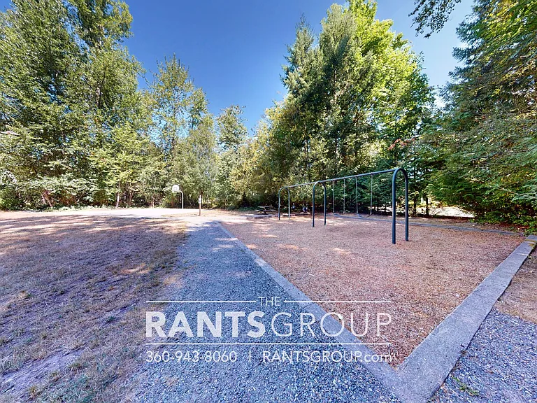 Lovely, wooded 2-bedroom apartment with a large private deck and in-unit washer & dryer! — Photo 50