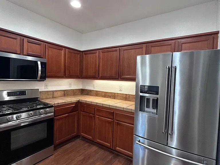 Gas stove, Microwave, and Refrigerator