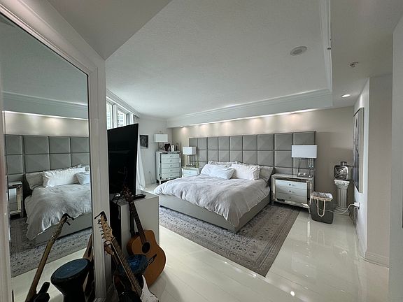 Master bedroom, furnished with king-size adjustable remote-control bed