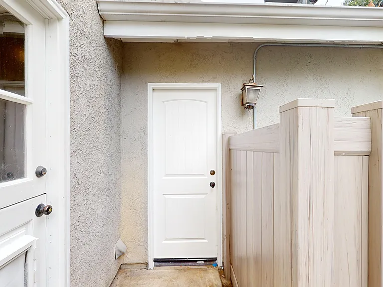 Garage Door Leading To Backyard