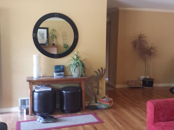 The front door opens to a full storm- door (glass and screens) that provides security and fresh air in the spring and fall.