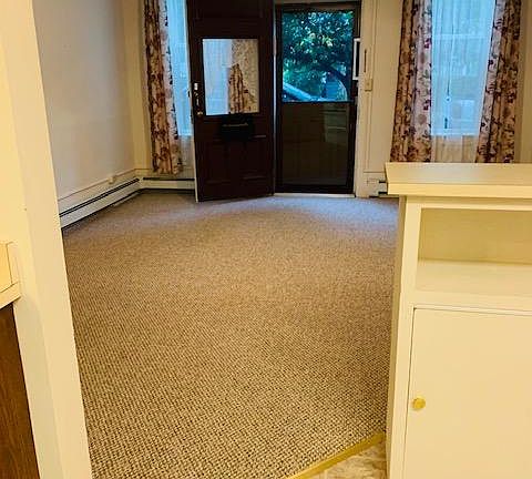 View of Living Room and Entrance from Kitchen