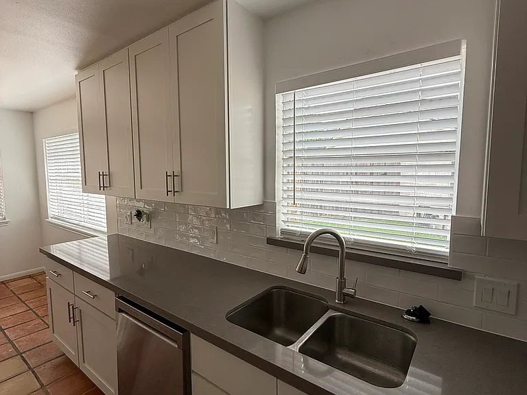 Kitchen with deep sink & large counter space
