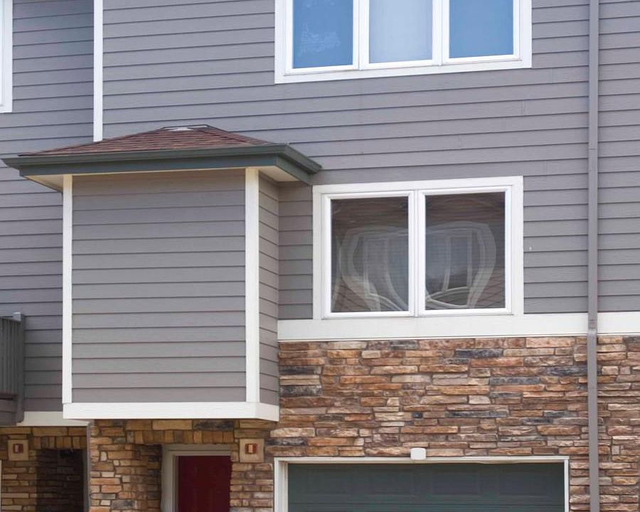 2 bedrooms, 2 baths, attached garage, fridge, dishwasher, washer/dryer, deck, gas fireplace, AC/Heat, and over 1400 sf living space.