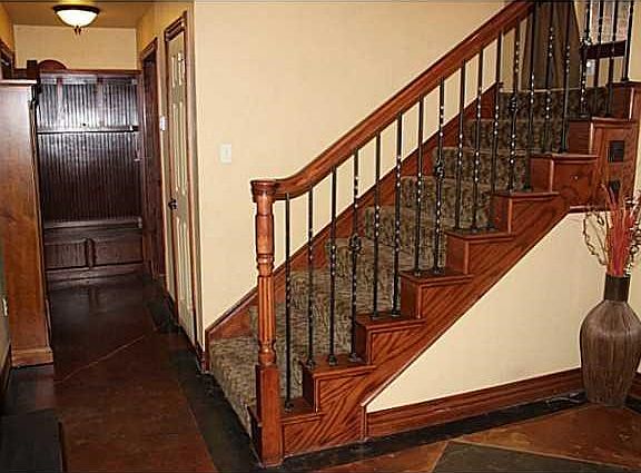 Exterior Front. Staircase to upper level.