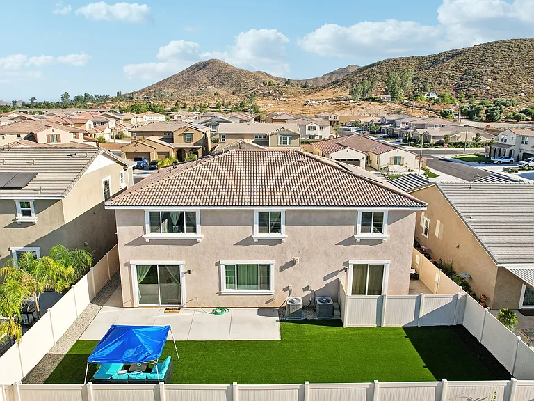 Gated backyard, a secure haven for kids and pets to play freely!
