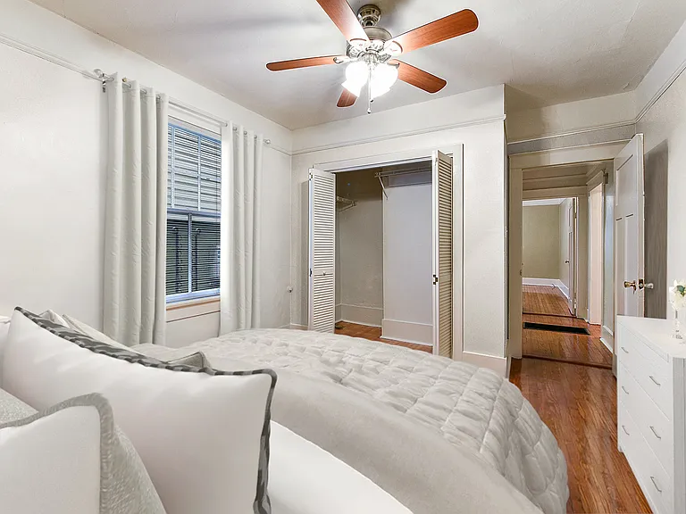 Second view of spacious middle bedroom. Fits Queen sized bed and plenty of other furniture. Very large closet. No furniture included
