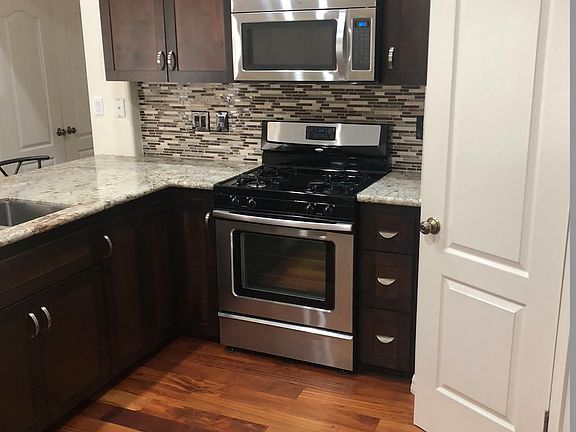 Granite counter and stainless steel appliances