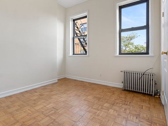 3rd image of 61 E 3rd St APT 13