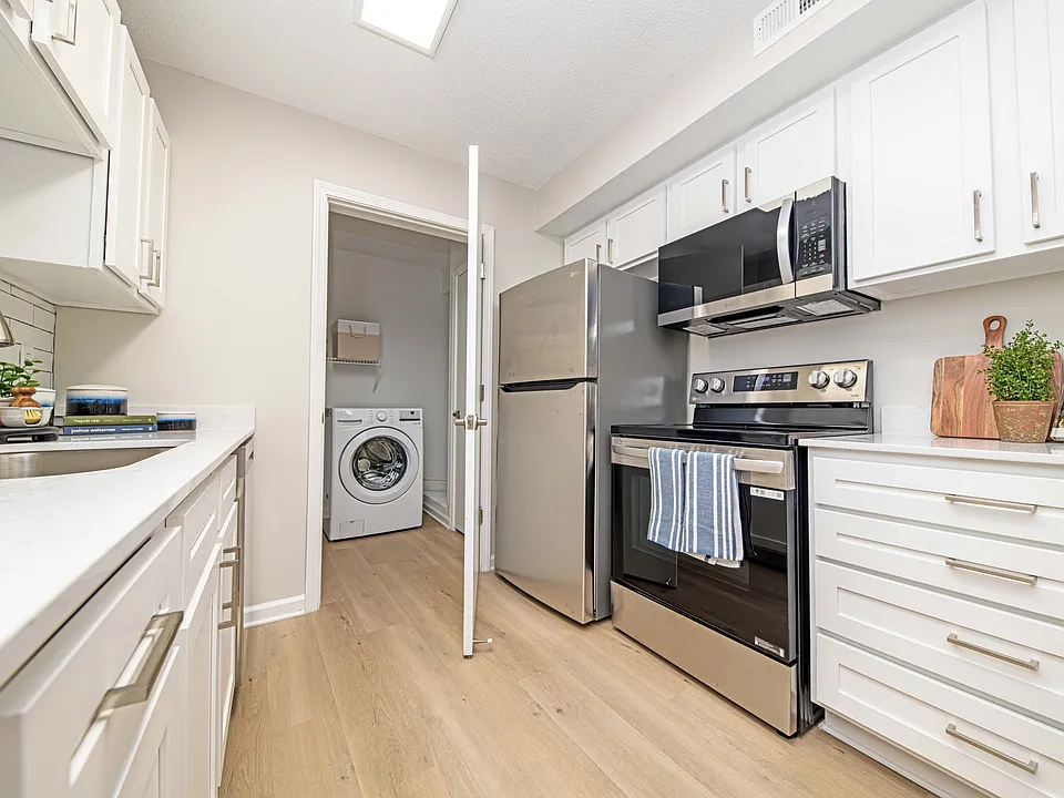 Stainless appliances and modern cabinetry