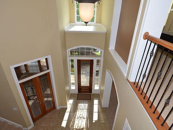 The two story foyer is just the beginning. Tile floor with inlaid pattern.
