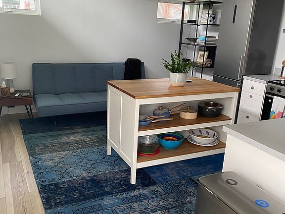 Main Living Space off kitchen. Large TV and Wi-Fi.
