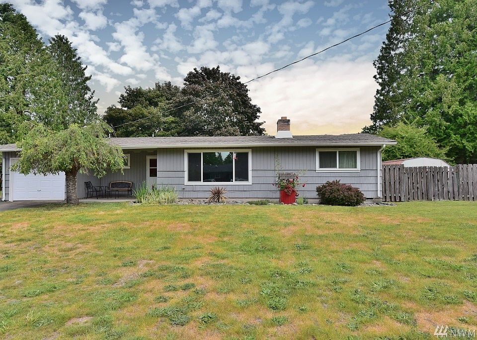 Large deck with access to bonus room is ready for your summer barbecues. 