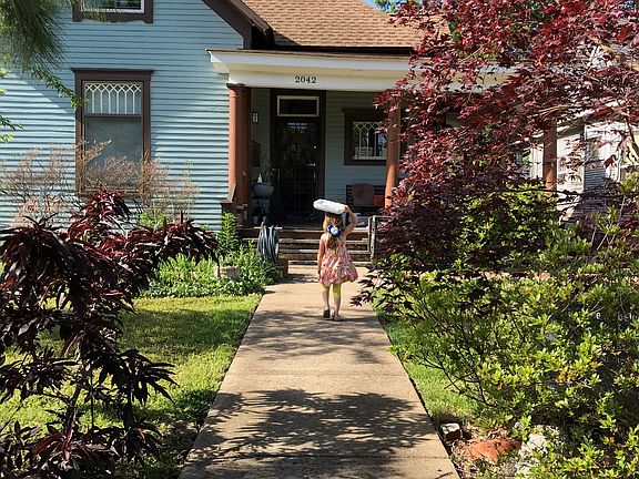 enter a home landscaped for privacy