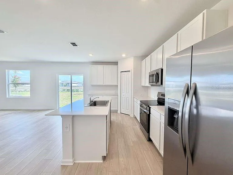 6472 Domizio Dr — Photo 7