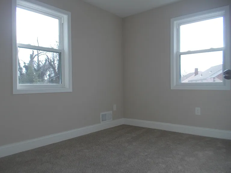 2nd Bedroom freshly painted with new carpet