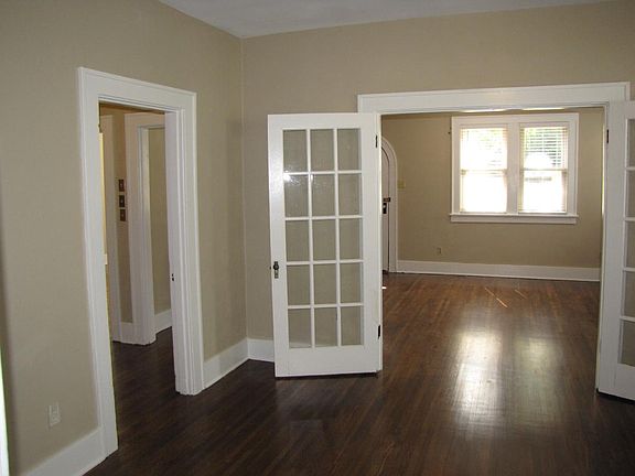 French doors... restored hardwood floors... tons of charm