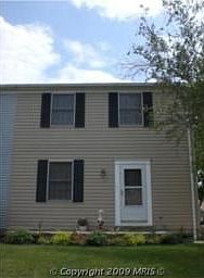 Must see home with paved stone porch and walkway