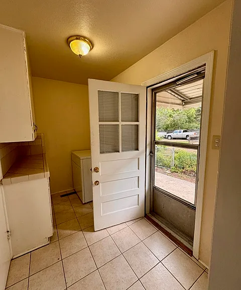 Side door in laundry room