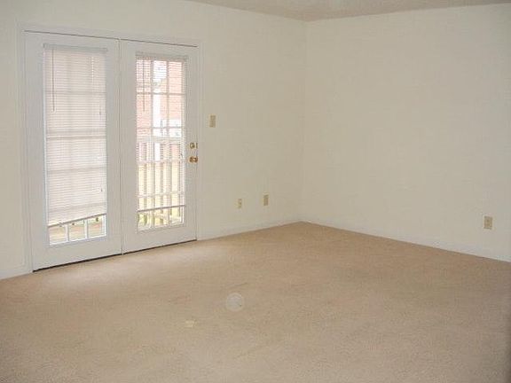Living room with French doors to balcony