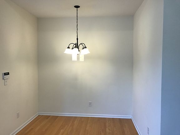 Dining area with new light fixture.