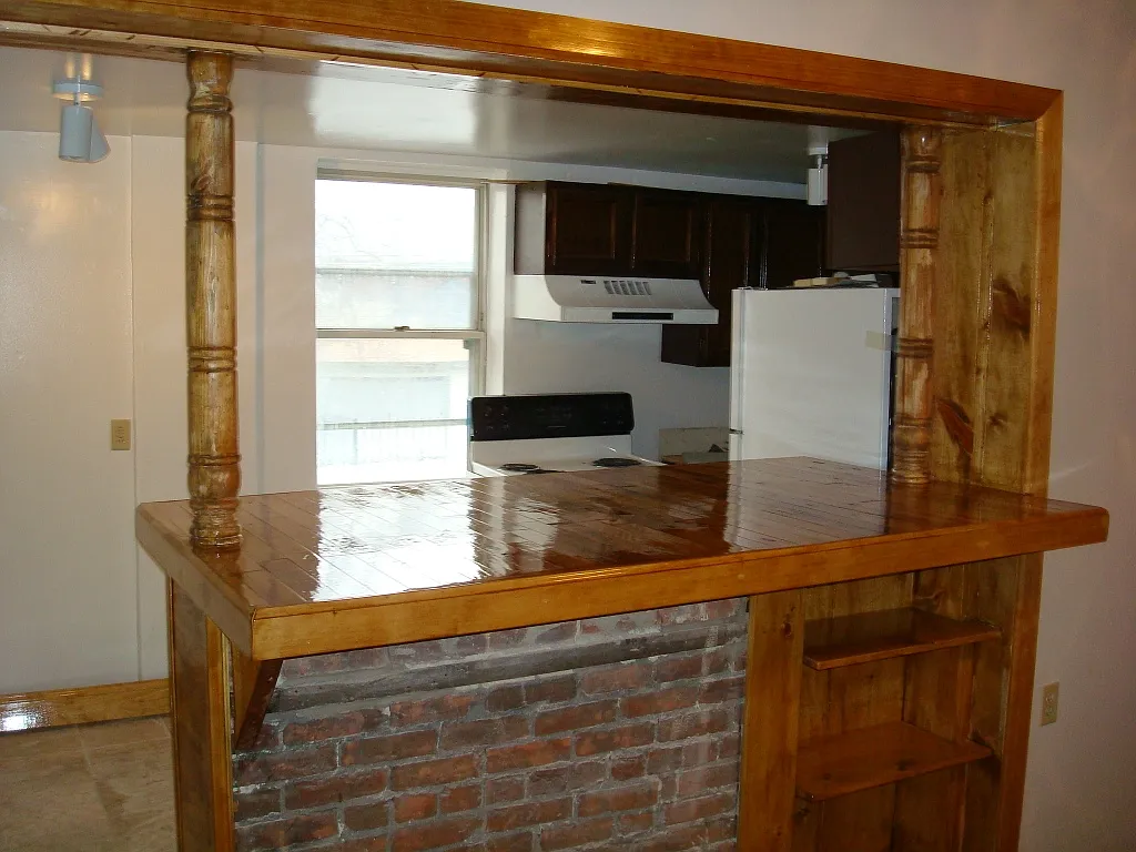 Dining area and kitchen view. - 120 Cottage St #3