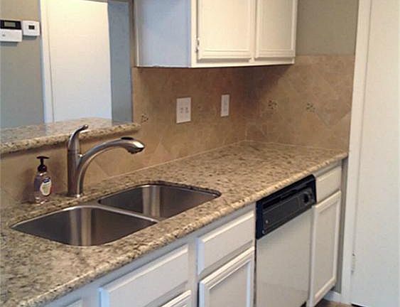 A Chef's dream! This kitchen has been updated to the max! Granite counter tops, under mount sink, de