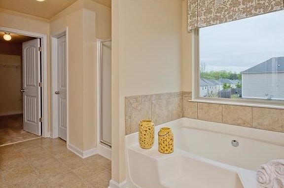deep tub with stand up shower...Huge closet space