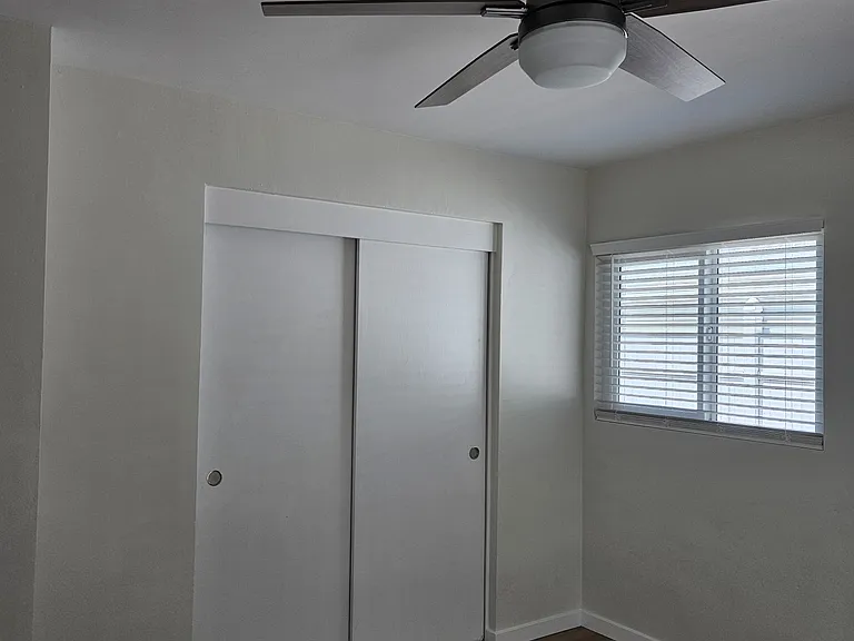 Bedroom With Remote Control Ceiling Fan
